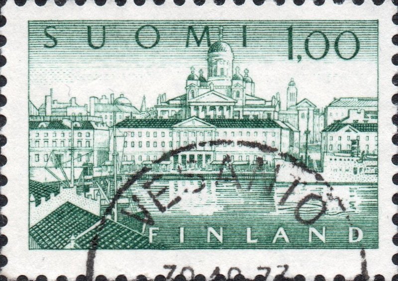 Finnish postage stamp featuring Helsinki Harbour with boats and city skyline, designed by Olavi Vepsäläinen, engraved by Reijo Achrén