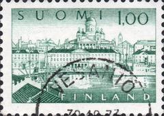Finnish postage stamp featuring Helsinki Harbour with boats and city skyline, designed by Olavi Vepsäläinen, engraved by Reijo Achrén
