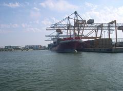 Container ships docked at Helsinki port with cranes and containers