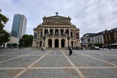 Historic Alte Oper building in Frankfurt am Main under clear blue sky