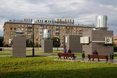 Gagarin Square park above the Gagarinsky automobile tunnel in Moscow with entrance vestibules and ventilation shafts of the Ploshchad Gagarina MCC station and a house at 6 Vavilova street