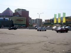 Druzhby Narodiv Square with modern buildings and clear blue sky