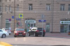 Street scene in Moscow on 25th of July 2016 featuring pedestrians and urban buildings