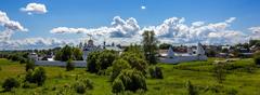 Pokrovsky Monastery in Suzdal, Russia, a historic cultural heritage site with golden domes and red brick walls