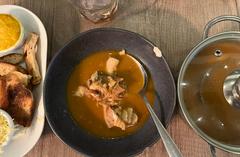 Bouillabaisse seafood stew served in a bowl at Fonfon restaurant in Marseille's Vieux-Port