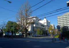 Entrance of Kitasato University in Tokyo Japan with building and blue sky