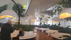 Modern interior of Heydar Aliyev Center with smooth white curves and open space