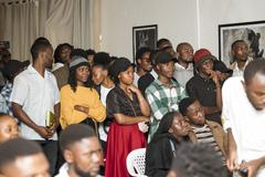 Children captivated by a theatrical performance at Institut Français in Goma