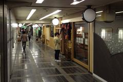 Restaurants in the basement of the Misono-za theatre in Nagoya with colorful warm lighting and signage