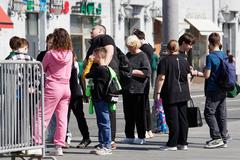 People walking in Taganka district, Moscow during spring