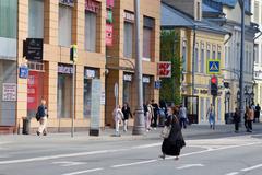People walking in Taganka district of Moscow in April 2025