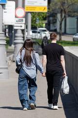 People walking in Taganka district of Moscow in April 2025