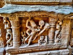 Chaturbhuj Temple at Gwalior Fort carved into rock face with intricate Nagara-style architecture and historical inscriptions in Madhya Pradesh, India