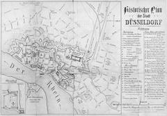 Historical map of the city of Düsseldorf with detailed fortress structures, bastions, gates, barracks, churches, monasteries, and public buildings from 1764 and 1866.