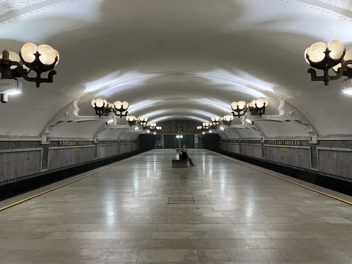 Ozbekiston metro station interior in Tashkent Uzbekistan with modern design and green accents
