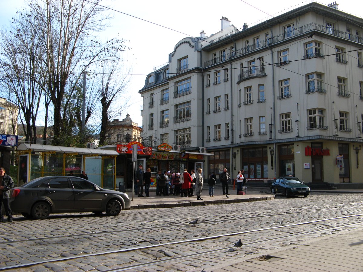 Street view of Bohdan Khmelnytsky Street in Lviv with buildings and pedestrian walkways