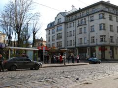 Street view of Bohdan Khmelnytsky Street in Lviv with buildings and pedestrian walkways