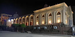 Mary Church Helwan exterior view with orange and white domes