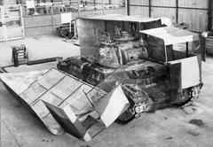 Tank with half 'Sunshield' camouflage cover in workshop at Middle East Command Camouflage Development and Training Centre, Helwan, Egypt, 1941