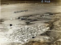 Aerial view of Helwan Aerodrome with runways and surrounding terrain