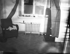 Broken window and shattered glass inside Althingi side room after 1949 riots