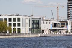 Moscow South River Terminal building and quay with boats on the river in April 2025
