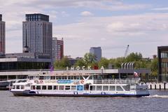 Moscow South River Terminal building and quay on the river in spring
