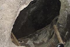 Historic Wieliczka Salt Mine entrance in Poland with rocky landscape