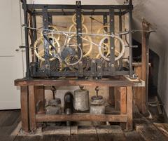Antique clocks displayed at Schloss Benrath museum showcasing ornate designs and historical craftsmanship