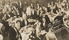 Inaugural dinner party for The Writers club at the Ambassador Hotel on December 1, 1920. Black and white detail from a panoramic photograph showing attendees seated at a long banquet table.