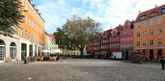 Gråbrødretorv square in Copenhagen with historic buildings and outdoor cafes