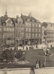 Historical photograph of Gråbrødretorv square in Copenhagen featuring people in traditional Danish costumes on June 22, 1904
