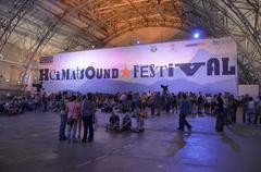 Live performance at Heimatsound 2014 featuring Passionstheater on stage with musical instruments and lighting