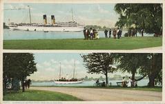 View of Detroit River from Belle Isle Park with city skyline and boats