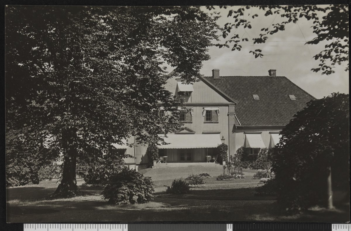 Historic Bygdøy Royal Estate in Oslo with traditional Norwegian buildings and lush greenery