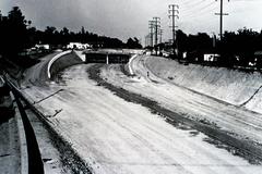 Construction of Via Marisol ramps on Arroyo Seco Historic Parkway with vehicles and workers