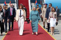 First Lady Melania Trump disembarking Bright Star at Cairo International Airport greeted by Entissar El-Sisi and Thomas Goldberger on October 6, 2018