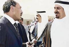 President Anwar Sadat of Egypt welcoming King Khalid of Saudi Arabia at Cairo Airport in 1975