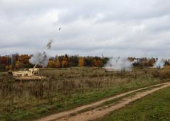 U.S. Army M109A7 Paladin howitzers firing live rounds during multinational artillery exercise Wawel Dragon in Poland