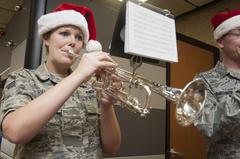 Senior Airman Laura Hall playing holiday music at Wilford Hall Ambulatory Surgical Center