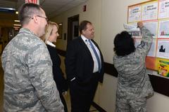 Col. John Andrus and Baptist Healthcare System members receiving briefing from Master Sgt. Celia Hermesch at Wilford Hall Ambulatory Surgical Center