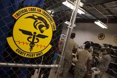 Air Force Critical Care Air Transport Team attending to patient during air medical evacuation
