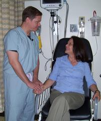 Dr. Christopher Koebbe talking with Col. Amy Bechtold at Wilford Hall Medical Center