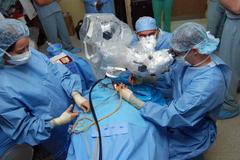 Surgical team performing ear surgery at Hospital Escuela in Honduras