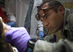 Dr. Chad Hivnor performing fractional carbon dioxide laser treatment on a patient's scar at Wilford Hall Ambulatory Surgical Center