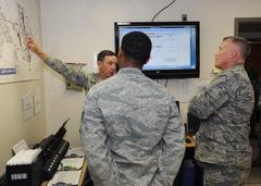 Maj. Gen. Byron Hepburn explaining wounded airmen transportation process to Maj. Gen. James McLaughlin at Wilford Hall Ambulatory Surgical Center