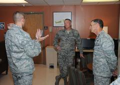 Maj. Jon Sinclair explaining services at Aeromedical Staging Facility to Maj. Gen. Byron Hepburn and Maj. Gen. James McLaughlin at Wilford Hall Ambulatory Surgical Center