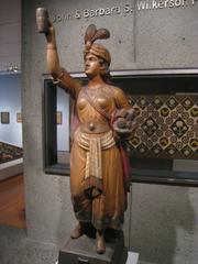 19th century wooden Indian statue in American Folk Art Museum New York City