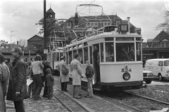 Old trams running in Amsterdam from Haarlemmermeer station in 1977, black and white photo
