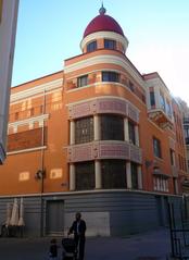 Exterior view of Teatro Carrión in Valladolid with ornate architectural details and clear blue sky